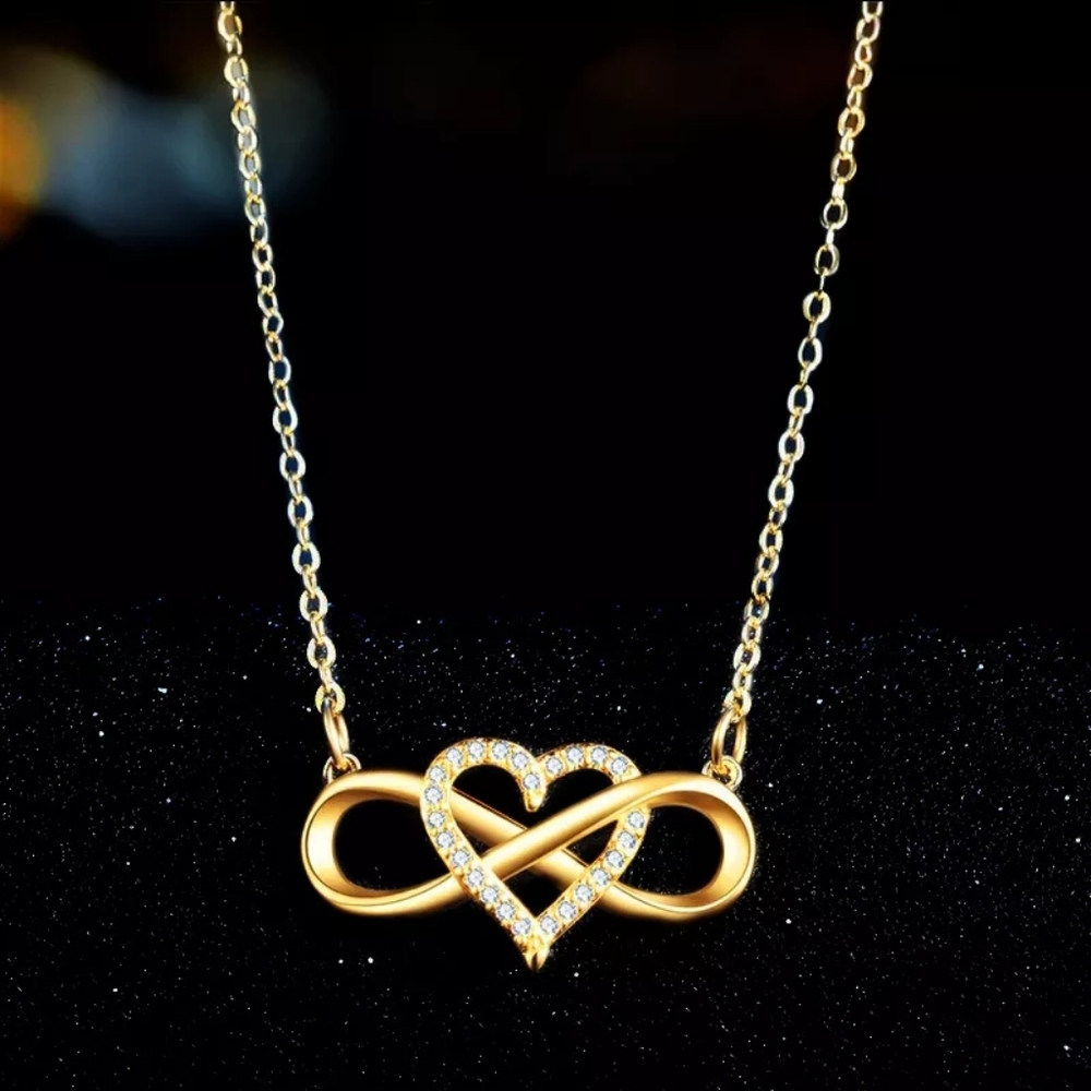 Gold heart shaped infinity love necklace.